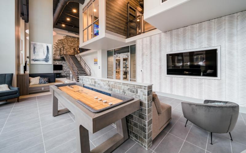 a room with a fireplace and a table