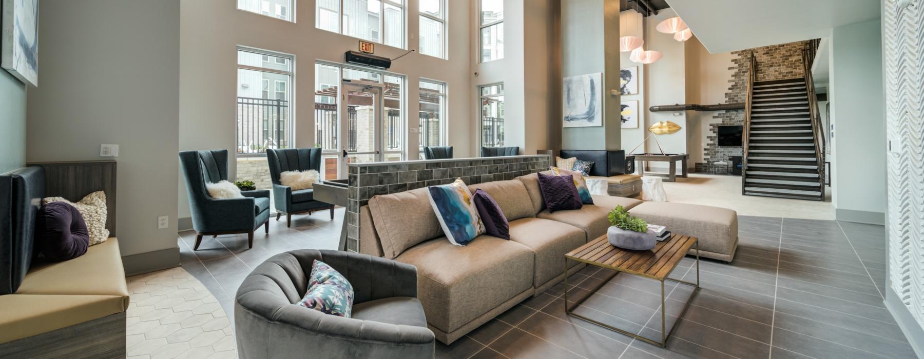 a living room with a large staircase